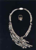 Necklace and coil from suit "Rains". 1994-95. Silver, icy and pink quartz, morion, prase, citrine, almadine, silicon.