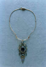 Necklace "Elegy". 1996. German silver, amethyst, chalcedonies.