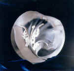 "Carried by wind". 1998. Quartz, topaz, silver.